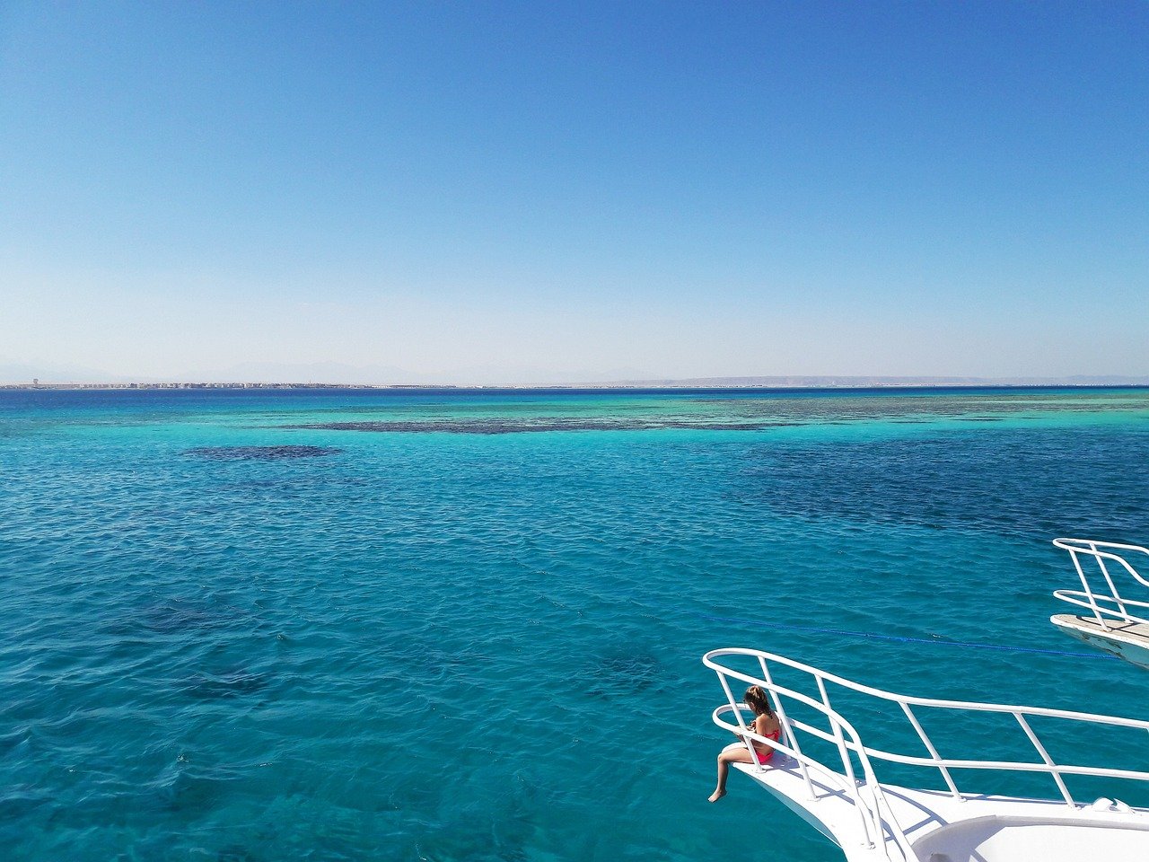 Crystal clear Red Sea waters viewed from a boat during a snorkeling trip in Hurghada, Egypt